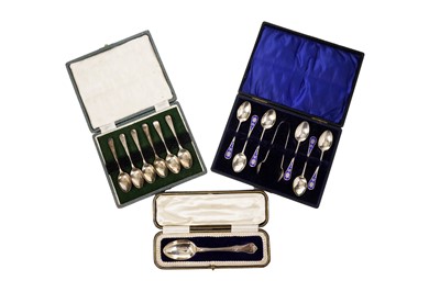 Lot 1588 - A selection of teaspoons and a pair of sugar tongs