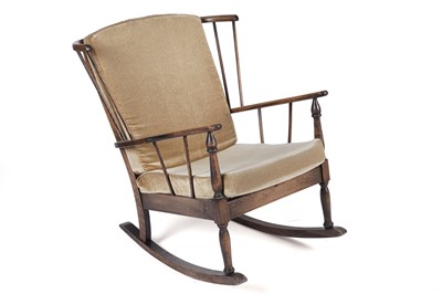 Lot 859 - Joynson Holland style beechwood rocking chair