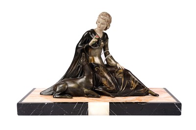 Lot 177 - An Art Deco model of a lady kneeling with a deer