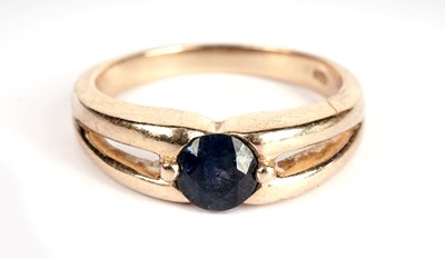 Lot 363 - A sapphire ring; and a ruby and diamond ring