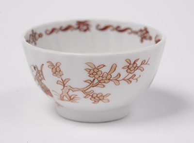 Lot 284 - A Chinese export 'Rouge de Fer' tea bowl and saucer