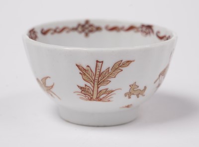 Lot 284 - A Chinese export 'Rouge de Fer' tea bowl and saucer