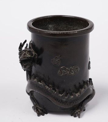 Lot 414 - A Chinese bronze brush pot