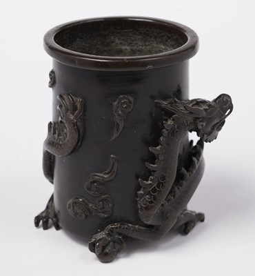 Lot 414 - A Chinese bronze brush pot