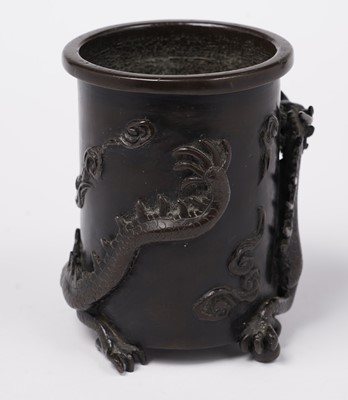 Lot 414 - A Chinese bronze brush pot
