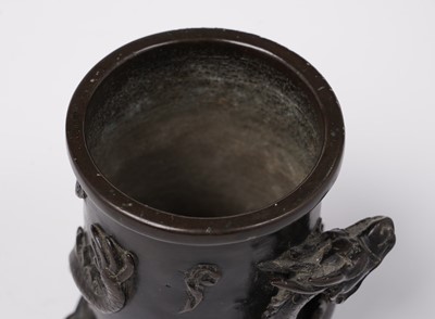Lot 414 - A Chinese bronze brush pot
