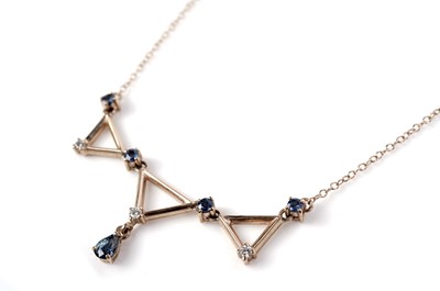 Lot 1156 - A sapphire and diamond necklace