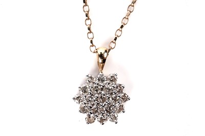 Lot 1160 - A diamond cluster pendant