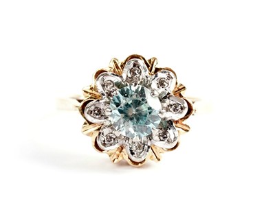 Lot 577 - A blue zircon and diamond cluster dress ring