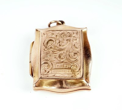 Lot 390 - A 9ct yellow gold portrait locket pendant on chain