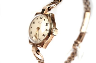 Lot 415 - Two gold cocktail watches, by Tissot and Rotary