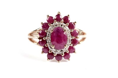 Lot 481 - A ruby and diamond cluster ring
