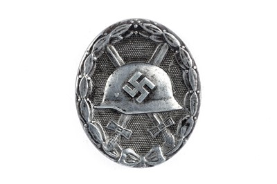 Lot 1059 - A German WWII silver wound badge