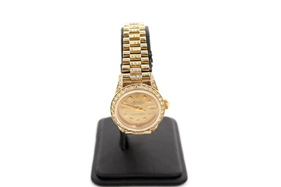 Lot 1040 - Rolex Oyster Perpetual Datejust: a lady's 18ct yellow gold cased superlative chronometer wristwatch