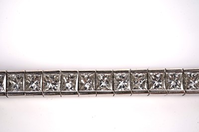 Lot 1161 - A radiant-cut diamond line or 'tennis' bracelet