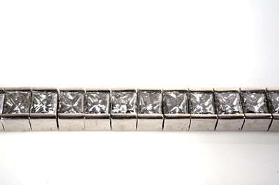 Lot 1161 - A radiant-cut diamond line or 'tennis' bracelet