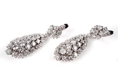 Lot 1171 - A pair of diamond drop earrings