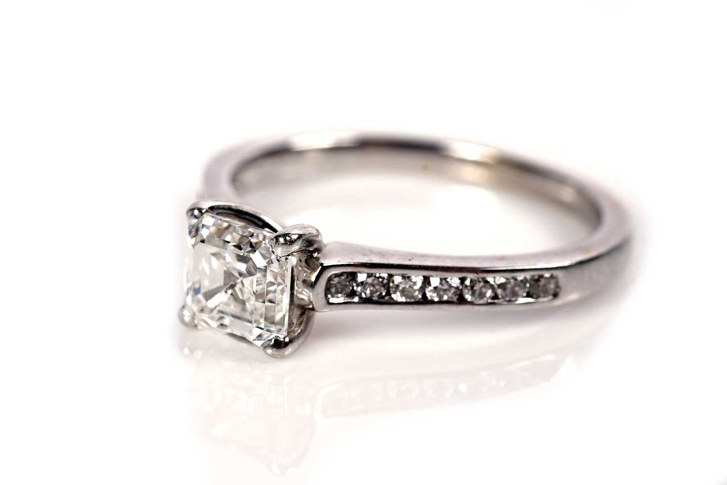 Lot 1187 - An Asscher-cut solitaire diamond ring