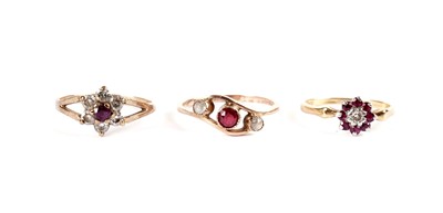 Lot 493 - Two cluster rings; and a three stone ring
