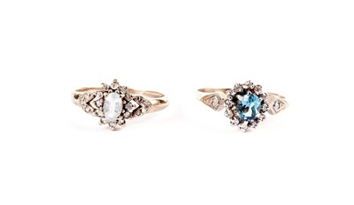 Lot 504 - A topaz and diamond cluster ring; and an aquamarine and diamond cluster