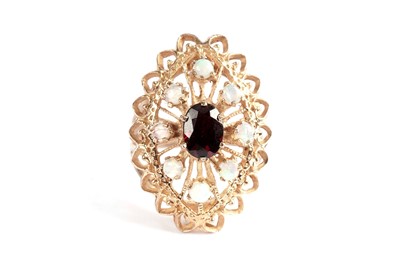 Lot 543 - A garnet and opal cluster ring