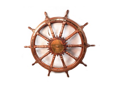 Lot 538 - A captain's stained oak ships wheel; and a bosun's whistle