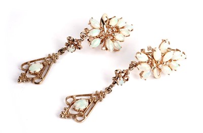 Lot 550 - A pair of opal and diamond drop earrings