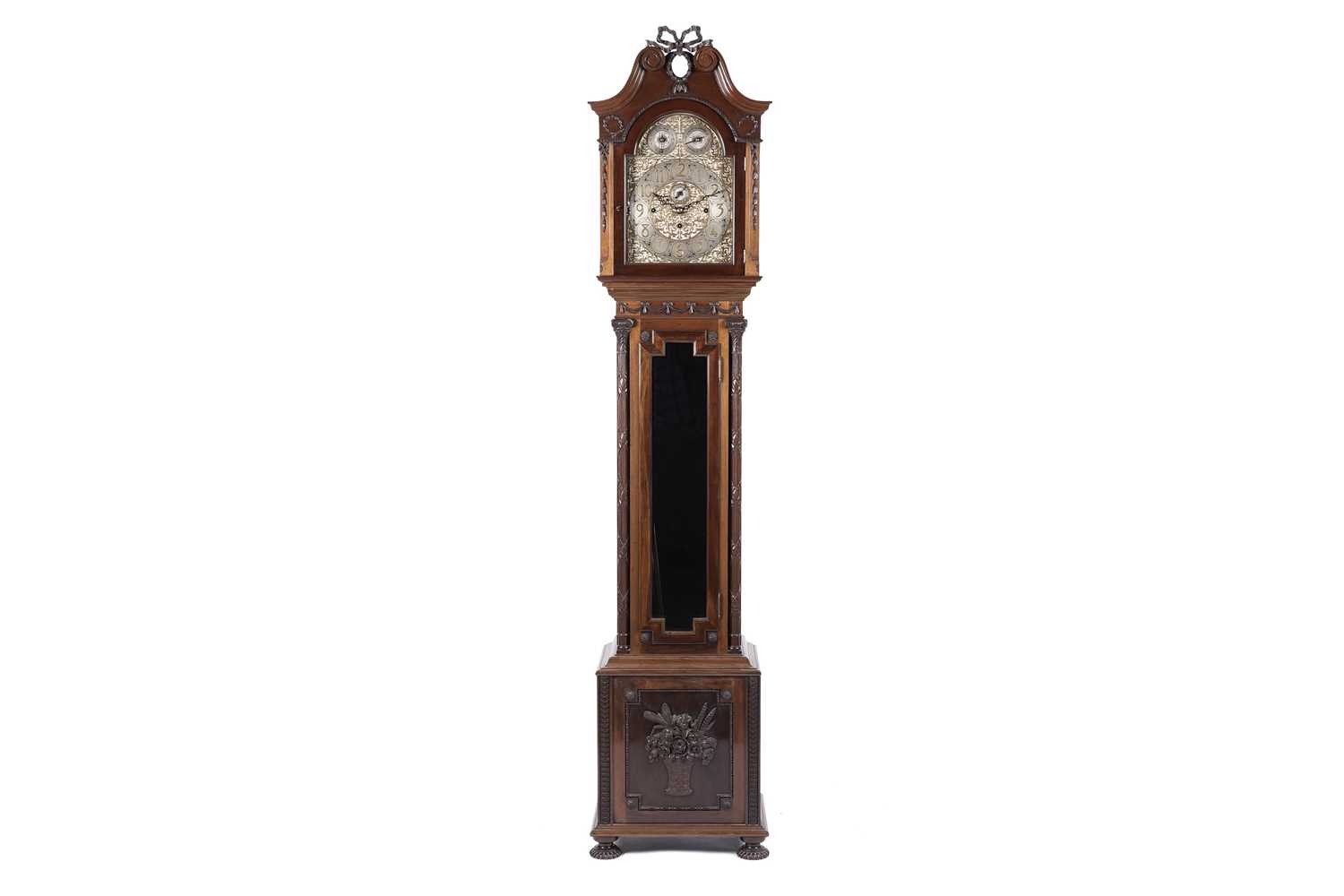 Lot 668 - A large and impressive carved walnut Elliott quarter chiming longcase clock