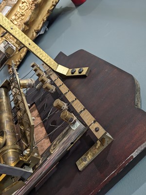 Lot 668 - A large and impressive carved walnut Elliott quarter chiming longcase clock