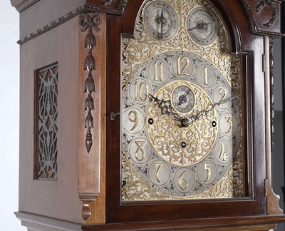 Lot 668 - A large and impressive carved walnut Elliott quarter chiming longcase clock