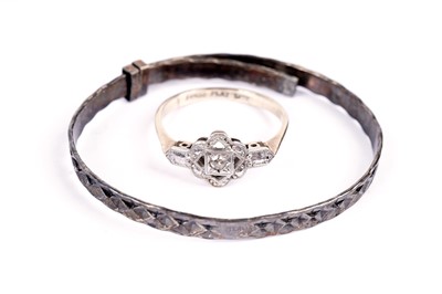 Lot 650 - A diamond ring; and childs bangle