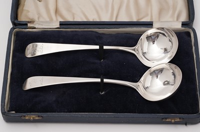 Lot 617 - A pair of George III silver sauce ladles