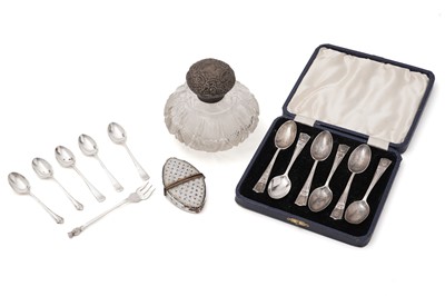 Lot 613 - A selection of silver spoons; and two scent bottles