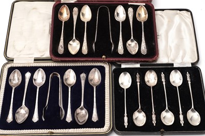 Lot 630 - A set of six silver apostle spoons and two other cased sets of teaspoons