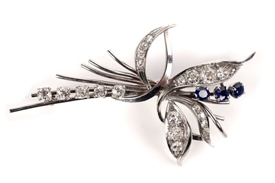 Lot 1121 - A sapphire and diamond floral spray brooch