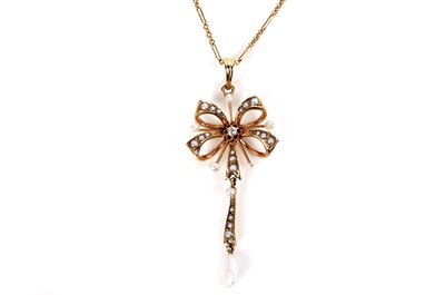 Lot 1123 - An Edwardian diamond and pearl pendant