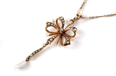 Lot 1123 - An Edwardian diamond and pearl pendant
