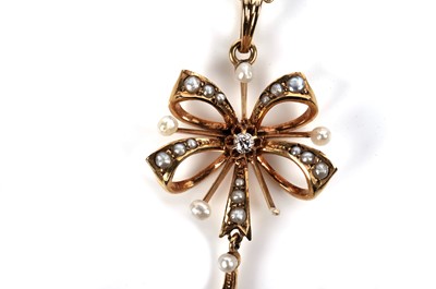 Lot 1123 - An Edwardian diamond and pearl pendant