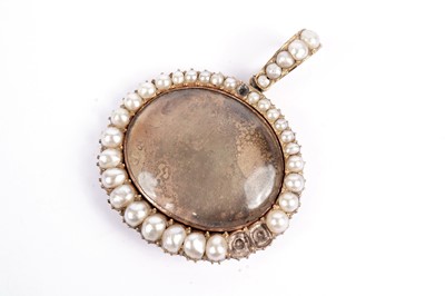 Lot 551 - A Victorian turquoise and seed pearl crescent brooch; and a locket