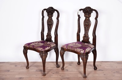 Lot 88 - A pair of decorative mid 18th century style carved and stained beech side chairs