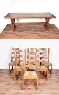 Lot 15 - An oak refectory dining table and six ladder back chairs
