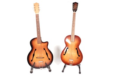 Lot 21 - Two 6-string acoustic cello-bodied guitars