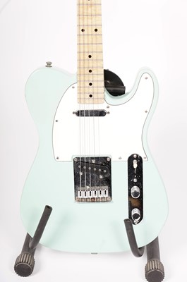 Lot 37 - A Squier Telecaster electric guitar