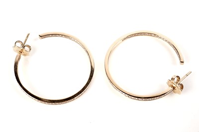 Lot 1191 - Mappin and Webb: a pair of diamond hoop earrings