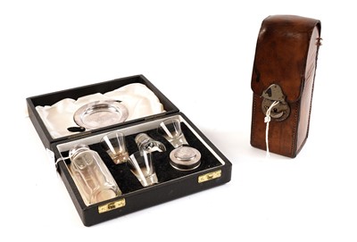 Lot 528 - A Victorian leather cased glass hunting flask; and a travelling Holy Communion set