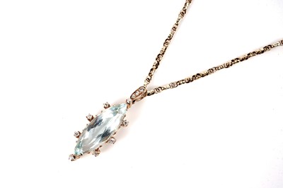 Lot 1127 - An aquamarine and diamond pendant