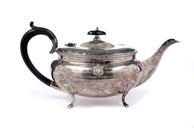 Lot 1466 - A George V silver teapot