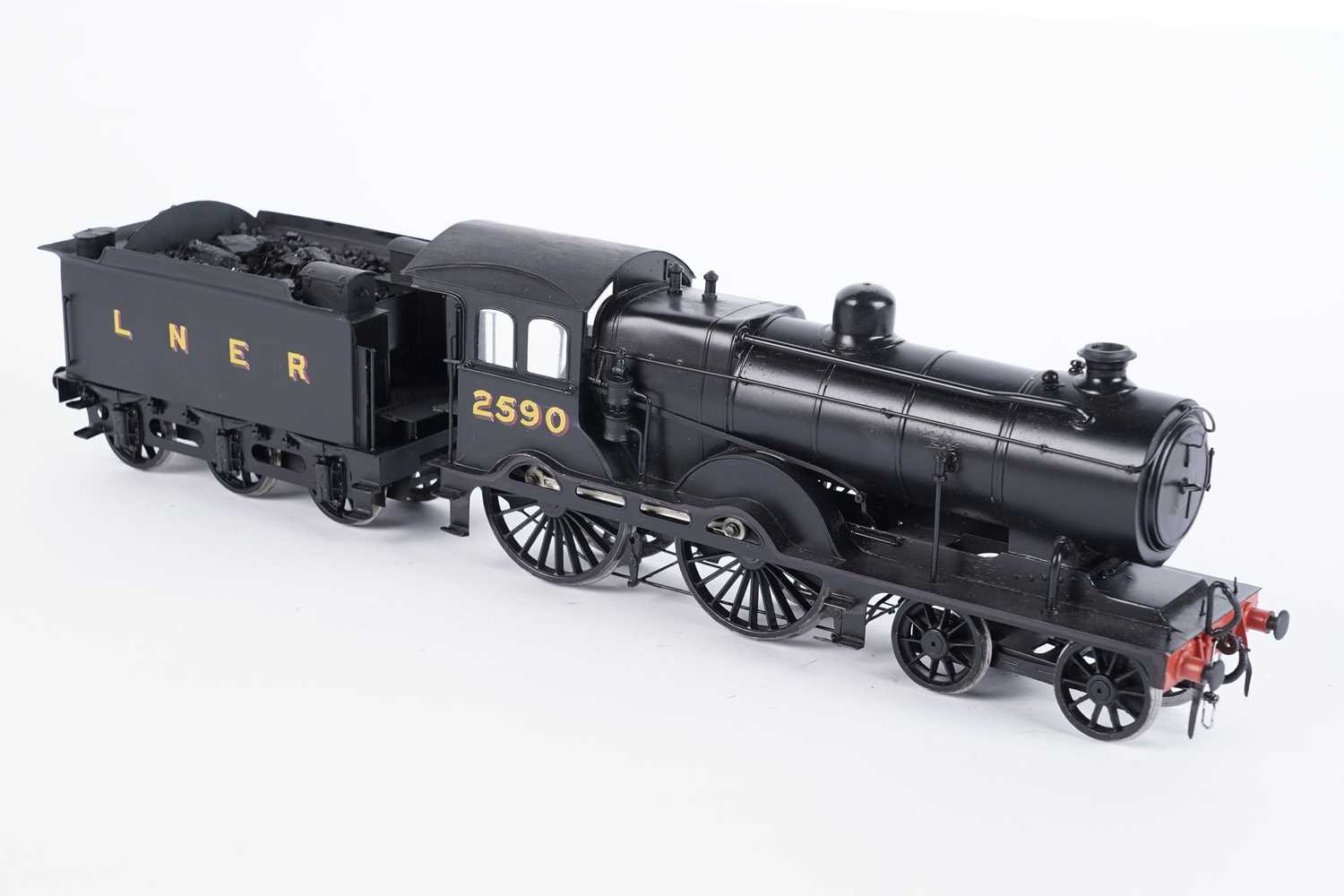 Lot 18 - A metal kit-built 0-gauge 4-4-0 locomotive and six-wheel tender