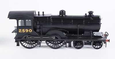 Lot 18 - A metal kit-built 0-gauge 4-4-0 locomotive and six-wheel tender