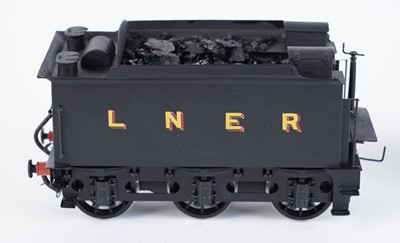 Lot 18 - A metal kit-built 0-gauge 4-4-0 locomotive and six-wheel tender